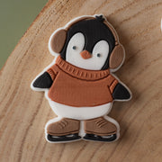Pinguin mit Ohrenschützern